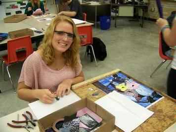Advanced student working on stain glass window